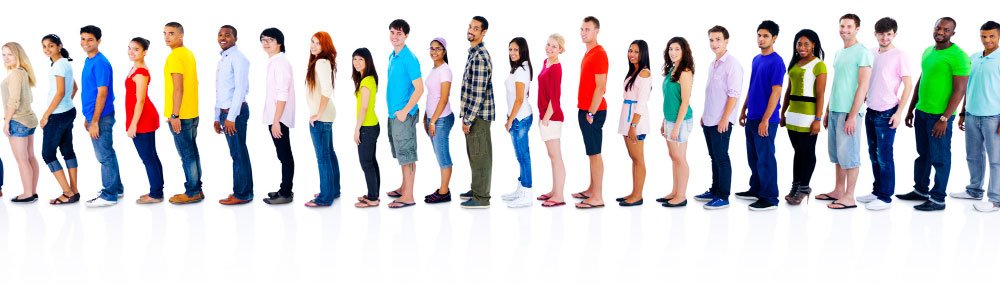 A group of different people belonging to various ethnicities standing in line