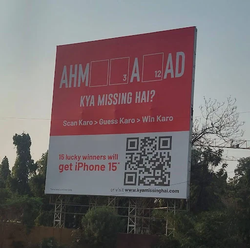A hoarding with a puzzle and scan code in Ahmedabad