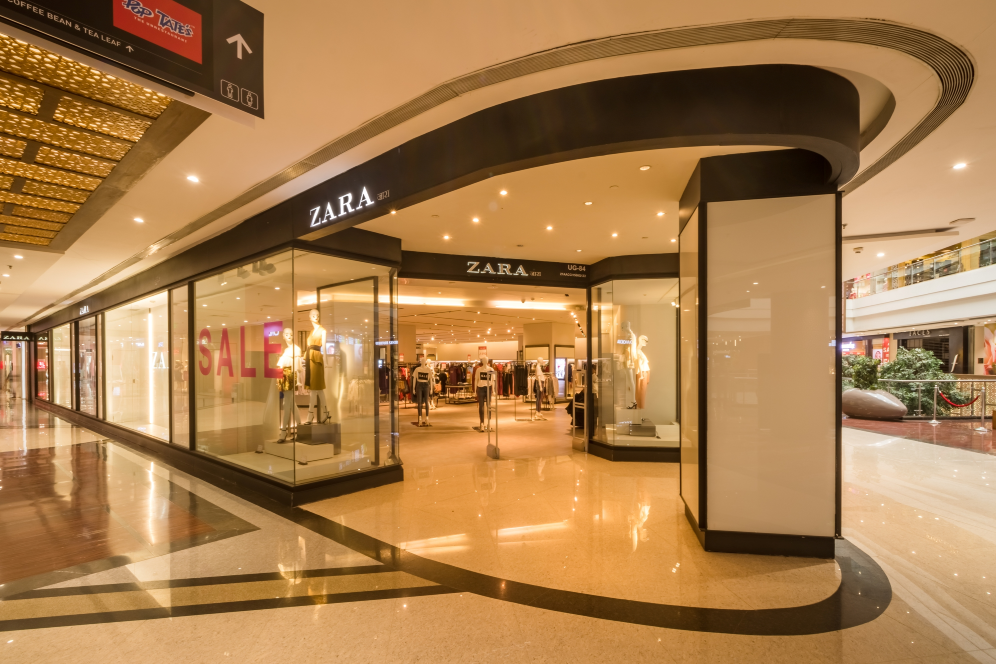 An image of a well-lit Zara store inside a shopping mall in India