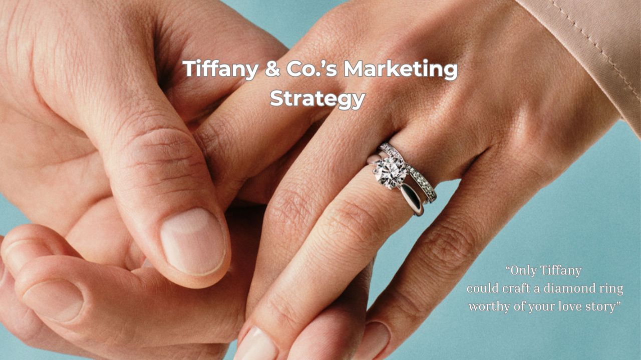 An image of two people holding hands with a Tiffany engagement ring