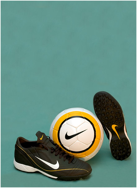 Black Nike Shoes and a football
