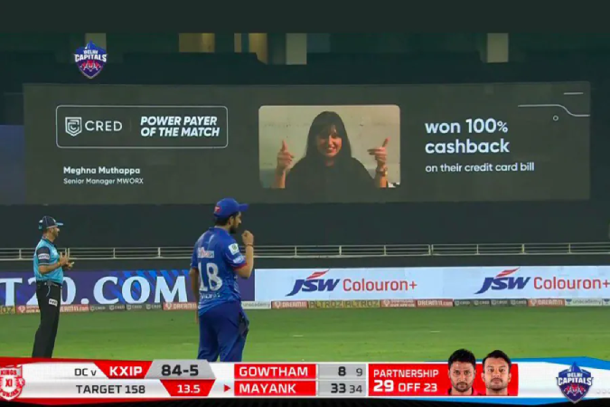 A Cred ad being displayed during a match in IPL