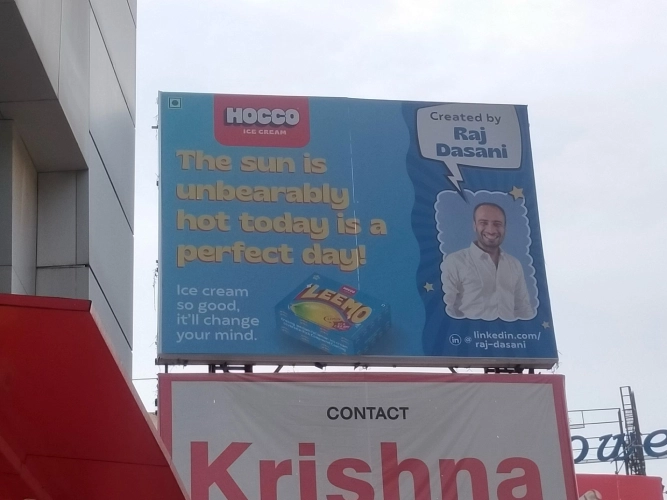  Image of a billboard with a photo of the person who created it 