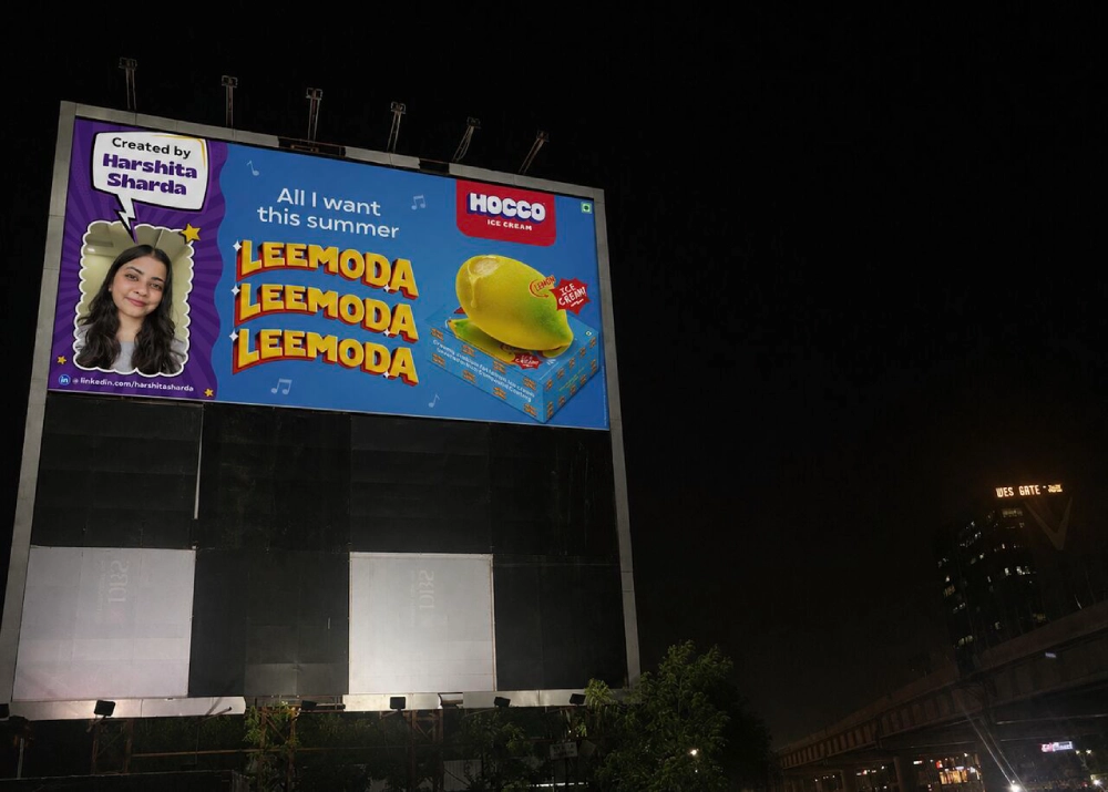 Image of a billboard with a photo of the person who created it 