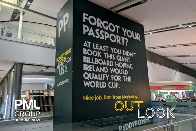 Large Paddy Power billboard inside a shopping mall with bold text joking about Ireland qualifying for the World Cup 
