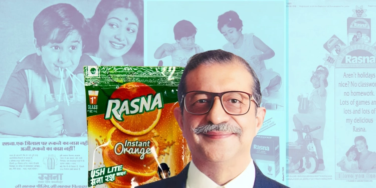 A man in formal wear is shown in front of Rasna instant orange drink packaging