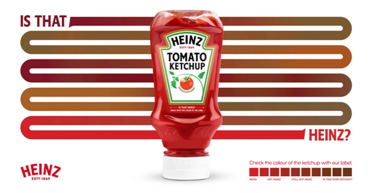  Heinz ketchup advertisement with the text "IS THAT HEINZ?" alongside a colour-matching chart comparing true Heinz red to off-brands. 